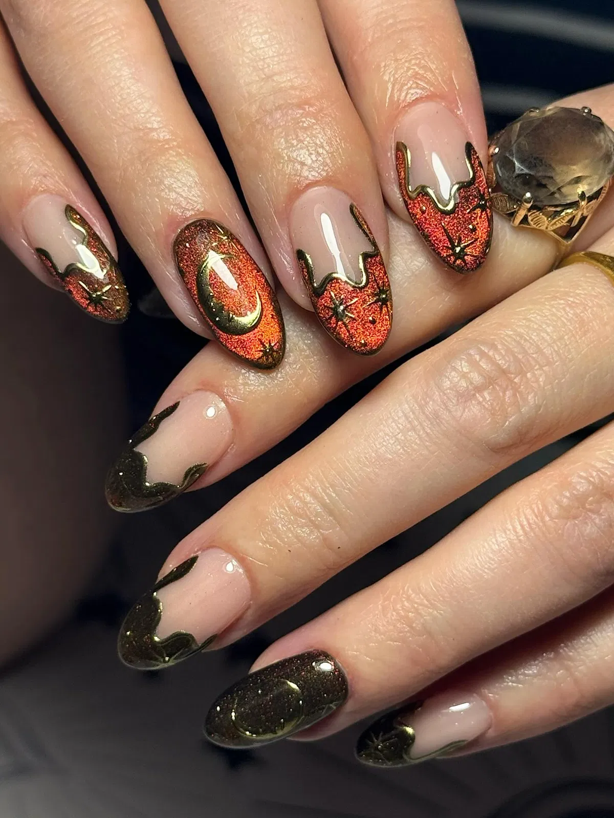 Orange glitter drips with gold-outlined details