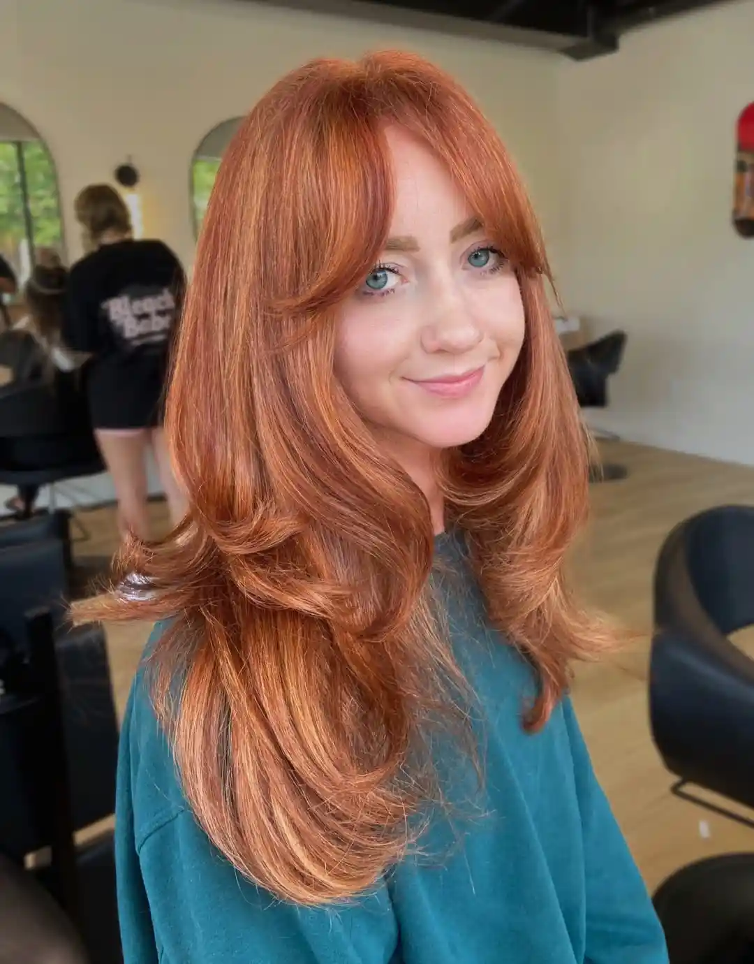 Copper Curtain Bangs with Layers