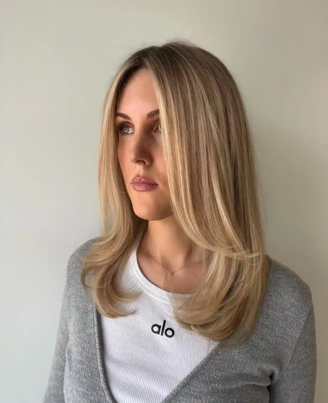 Smooth Shoulder-Length Blonde with Curved Ends