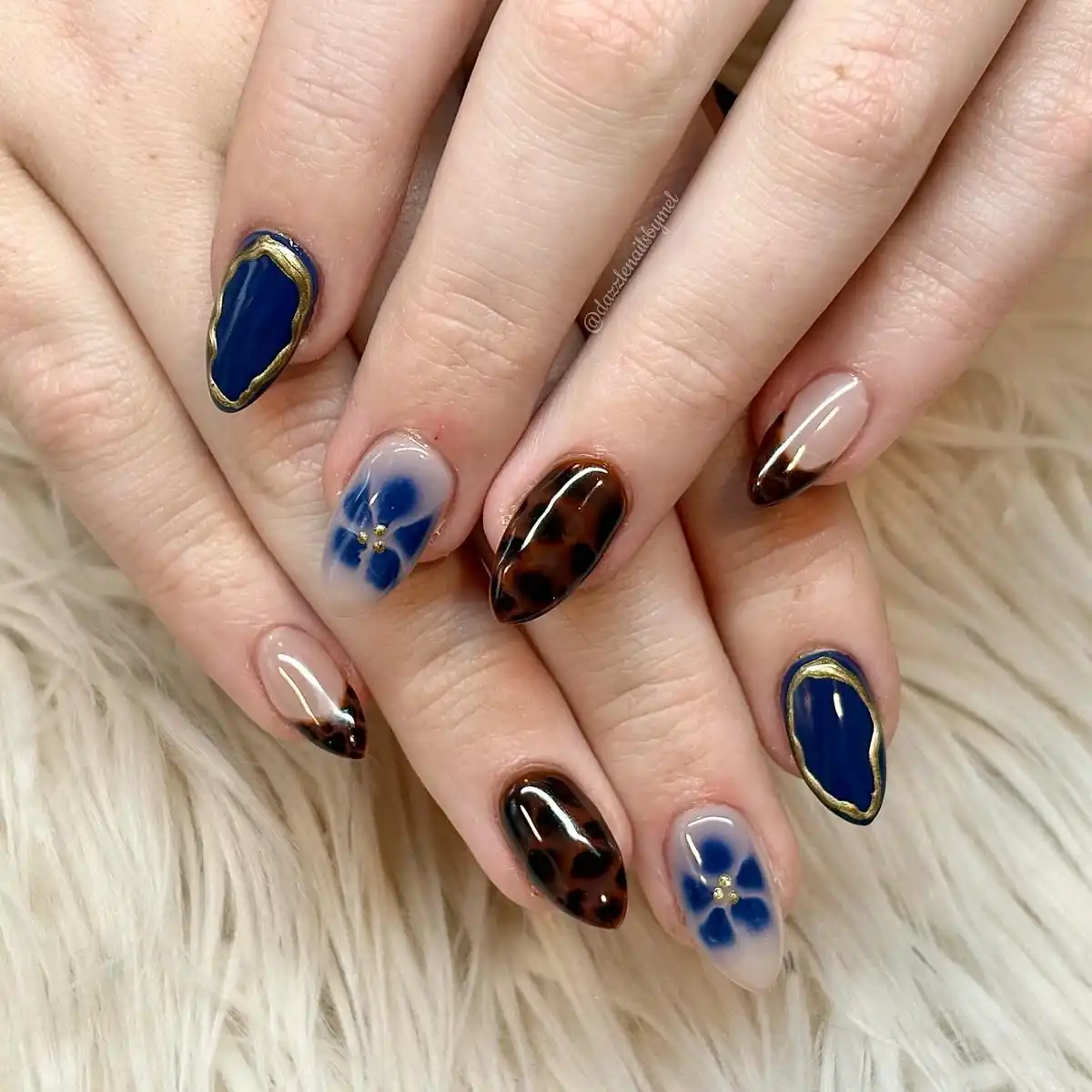 Navy and brown mix with gold outlines and blue florals