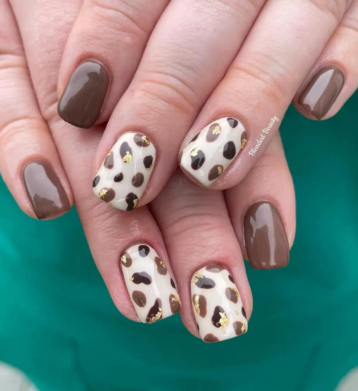 Cream-and-brown spotted accents with gold flecks