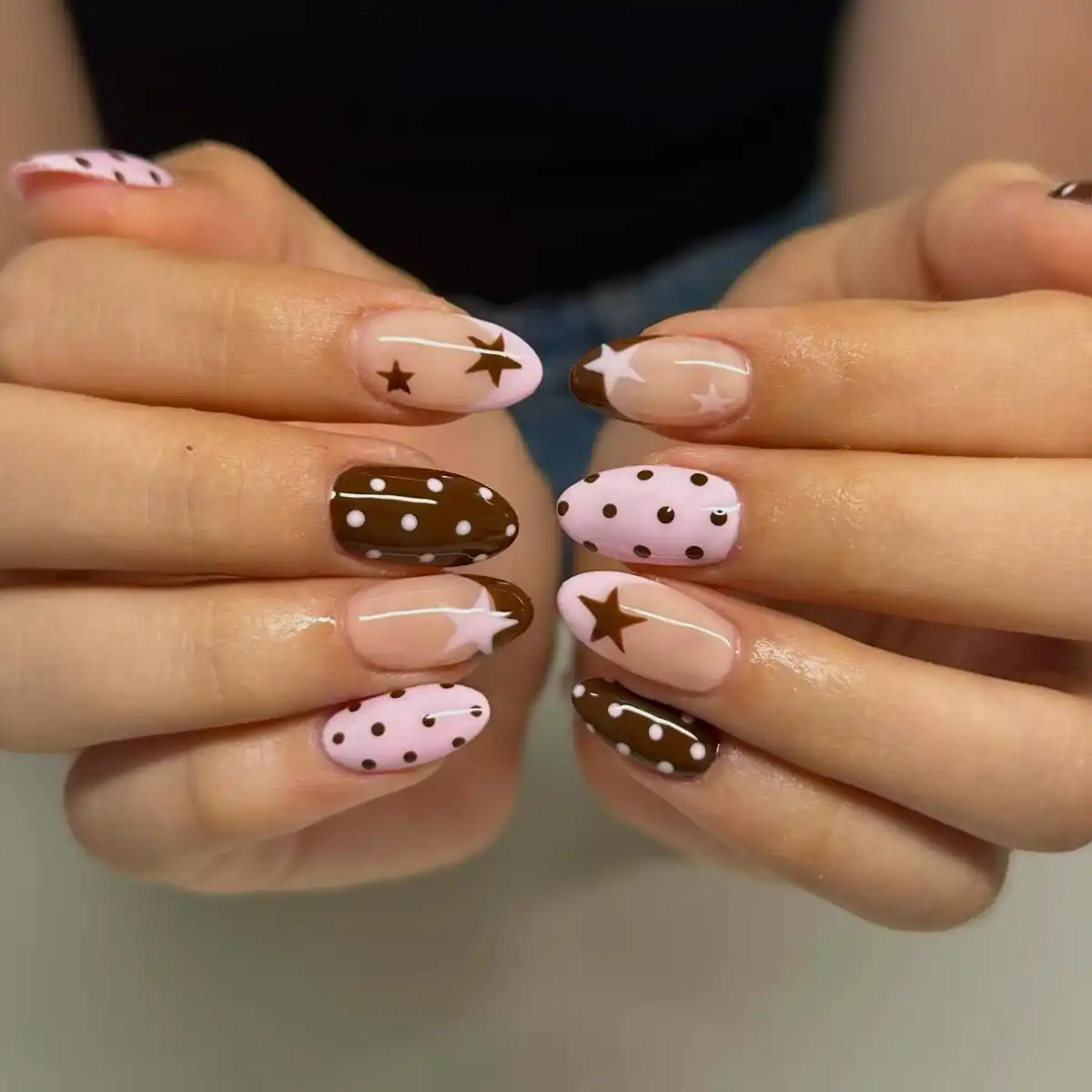 Stars, French tips, and polka dots in brown and pink