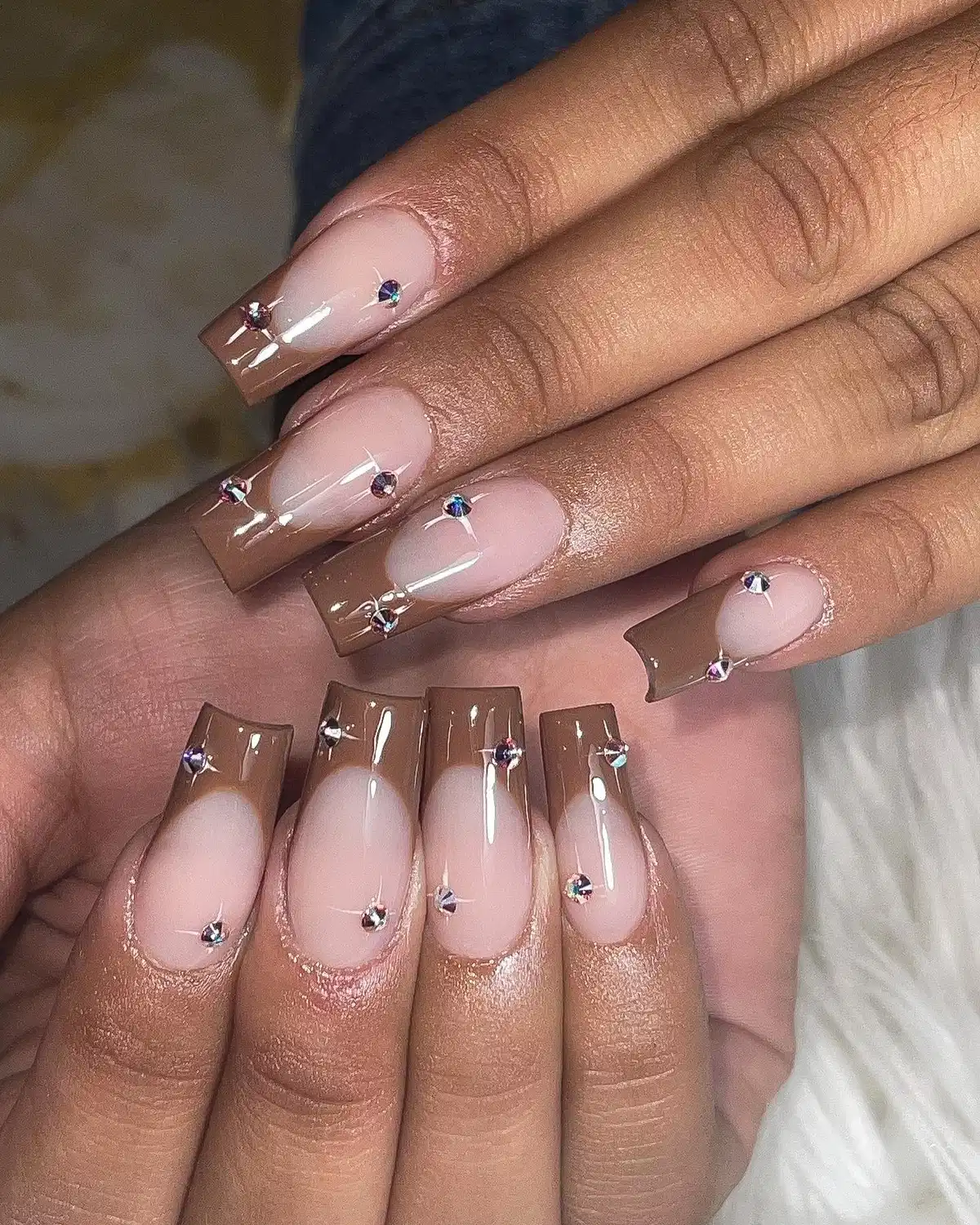 Translucent Brown French Tips with Small Gem Accents
