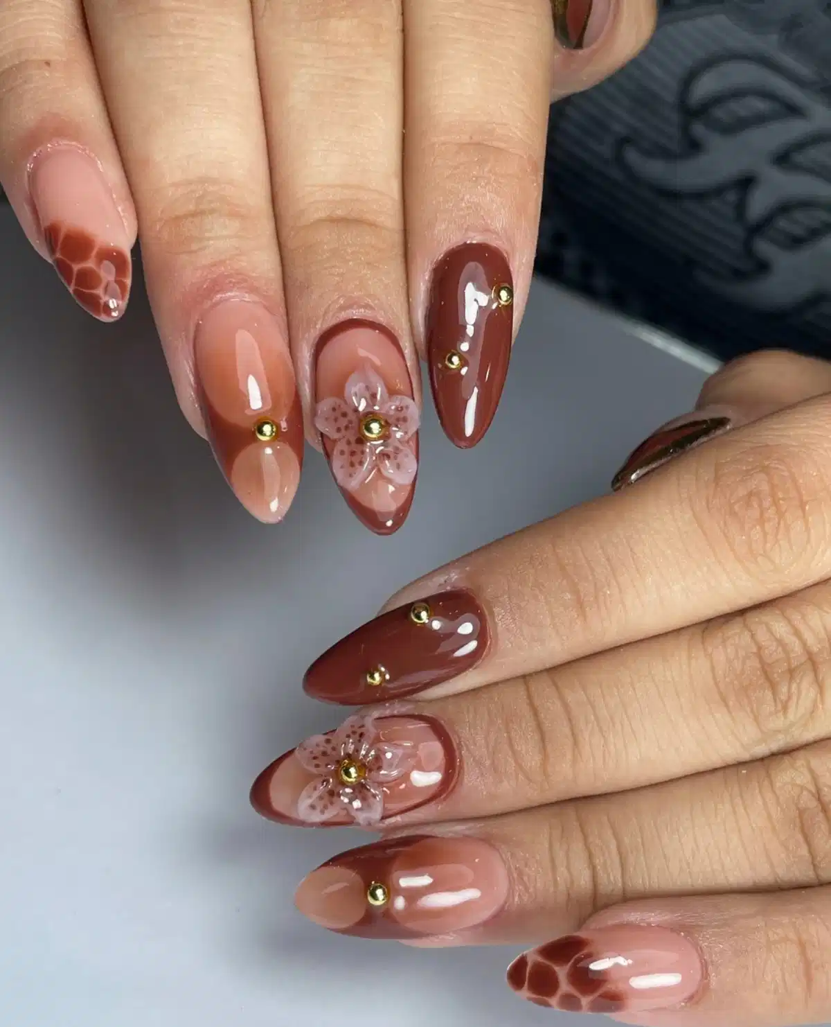 Brown ombre with 3D flowers and gold studs