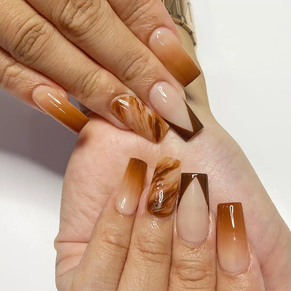 Glossy brown ombre with marbled accents