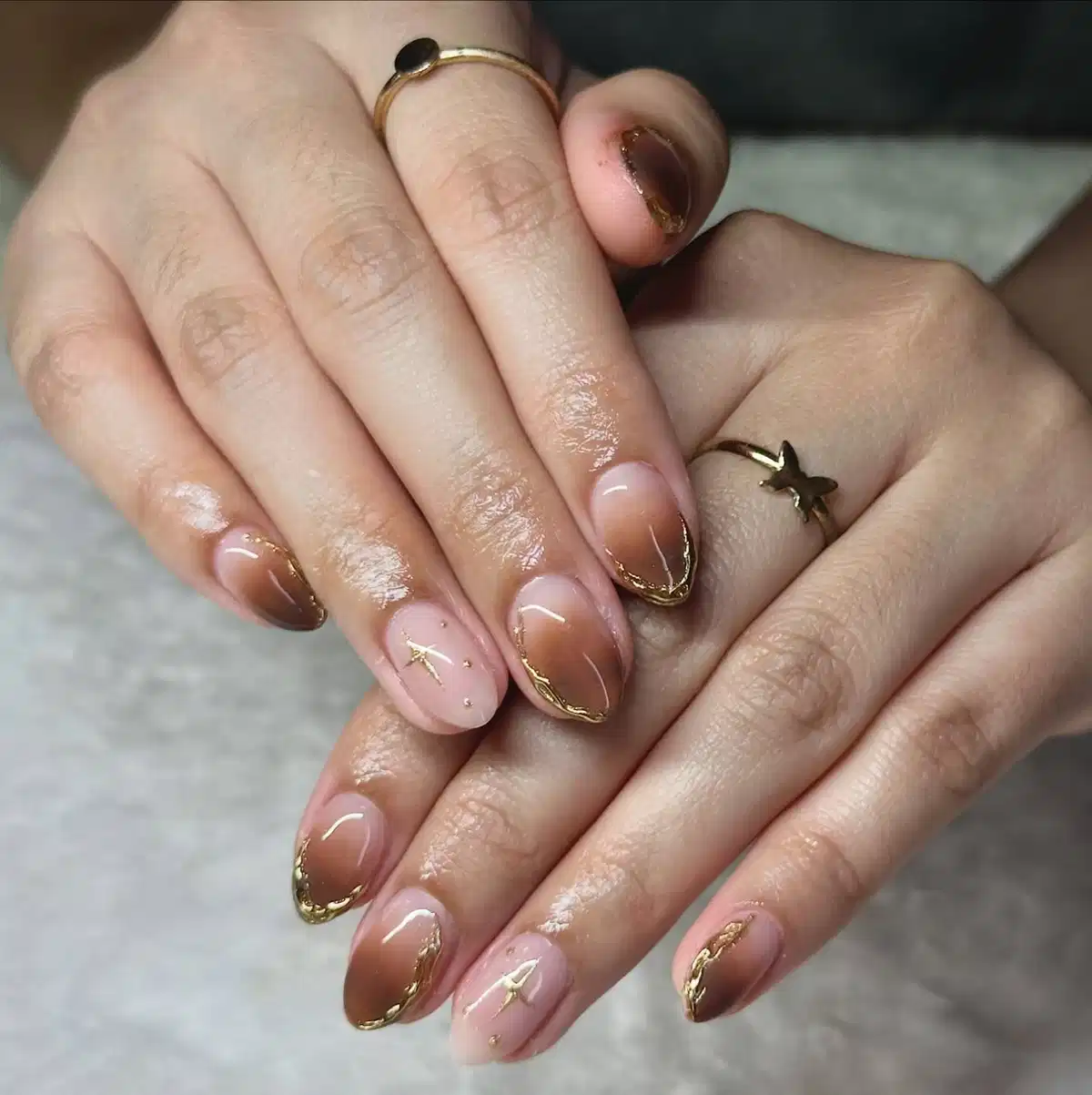 Brown ombre tips with gold edging