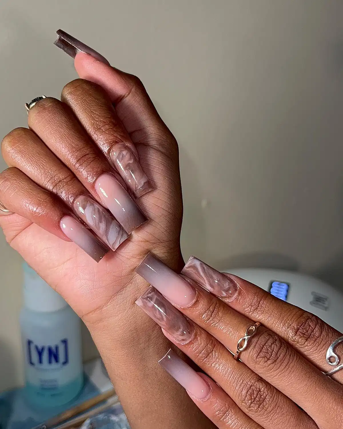 Taupe-brown ombre with smoky marble accents