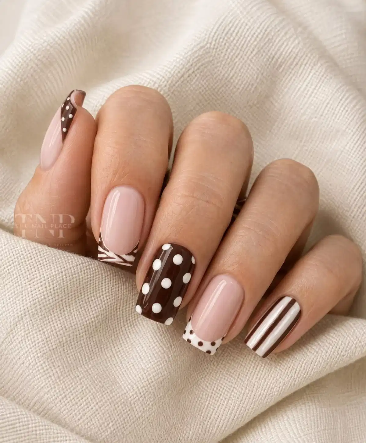 Mixed chocolate patterns: polka dots, stripes, and French tips