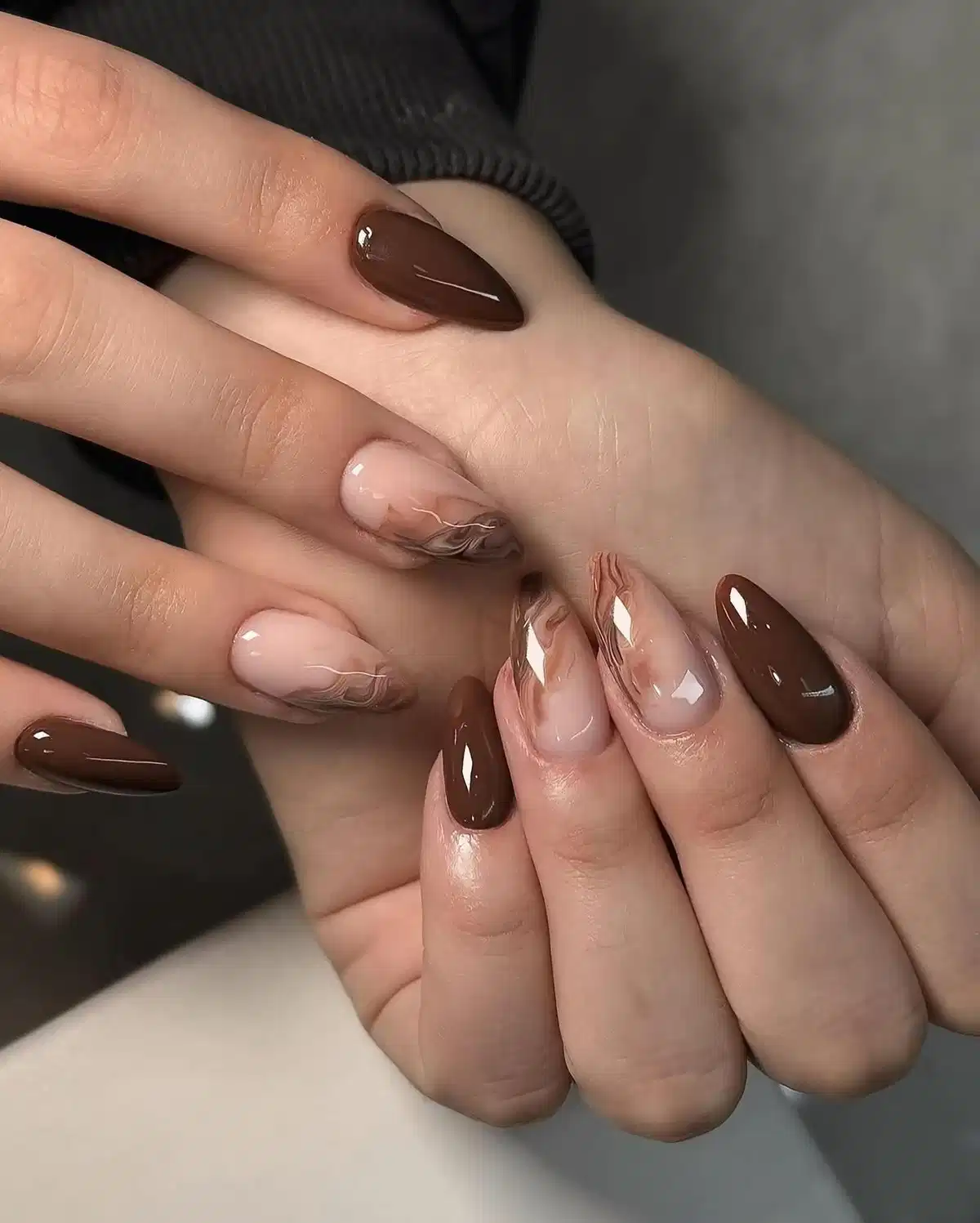 Glossy dark brown with nude marbled-line accents