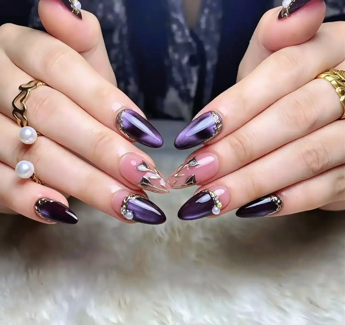 Dark purple almonds with nude metallic abstract accent nails