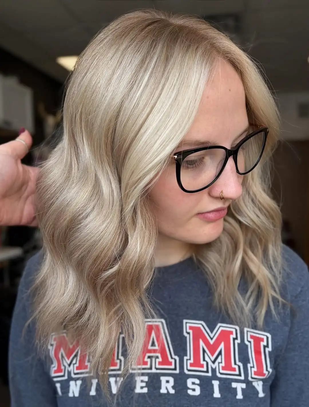 Light blonde waves with subtle darker roots