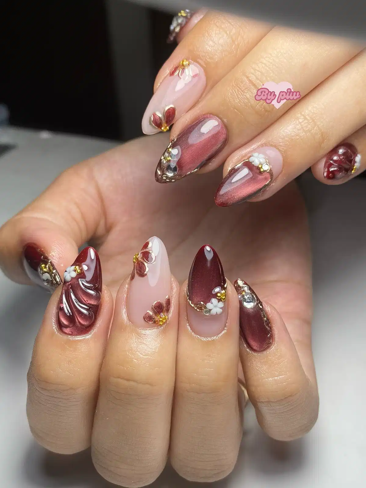 Maroon metallic accents with 3D flowers and rhinestones