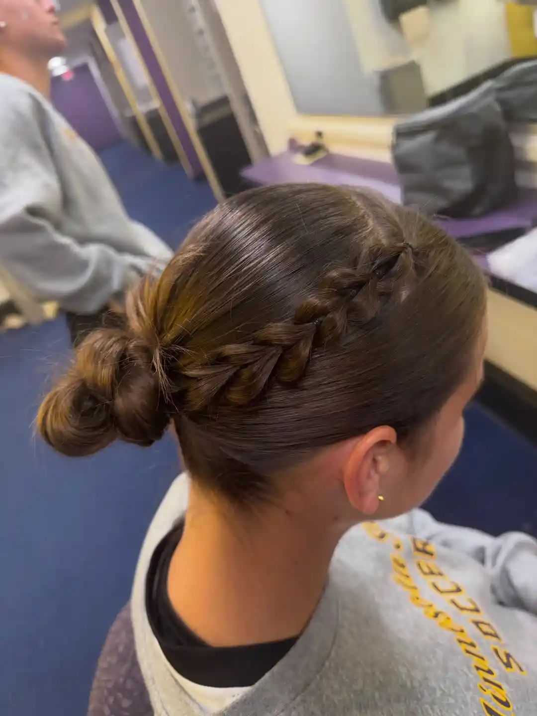 Side braid into sleek low bun