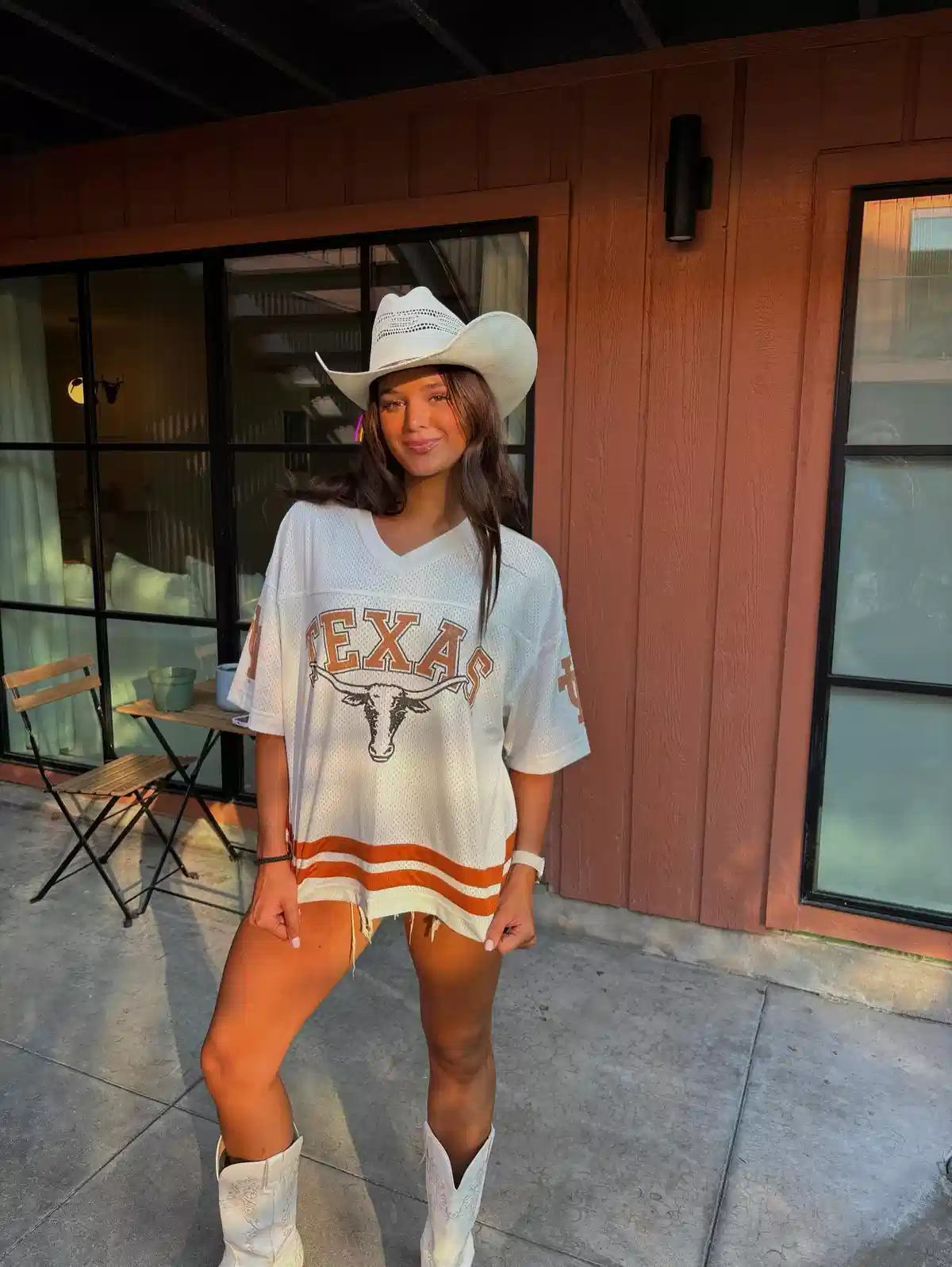 White “TEXAS” jersey with cowboy hat and white boots