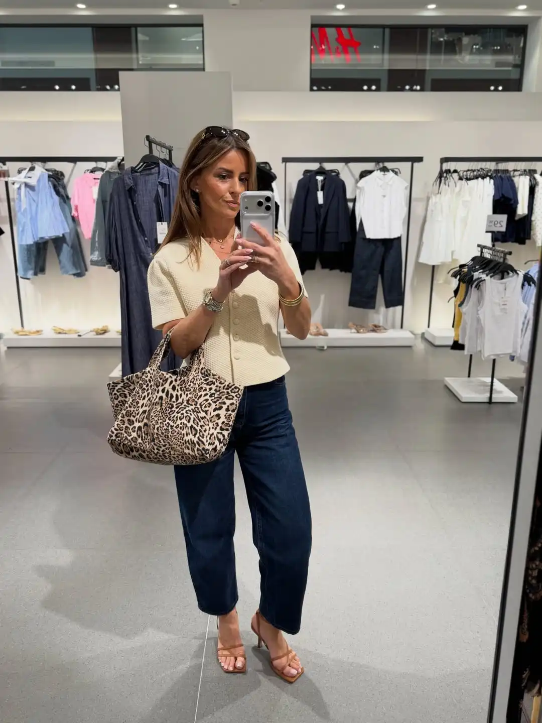 Cream textured top with cropped jeans and heeled sandals