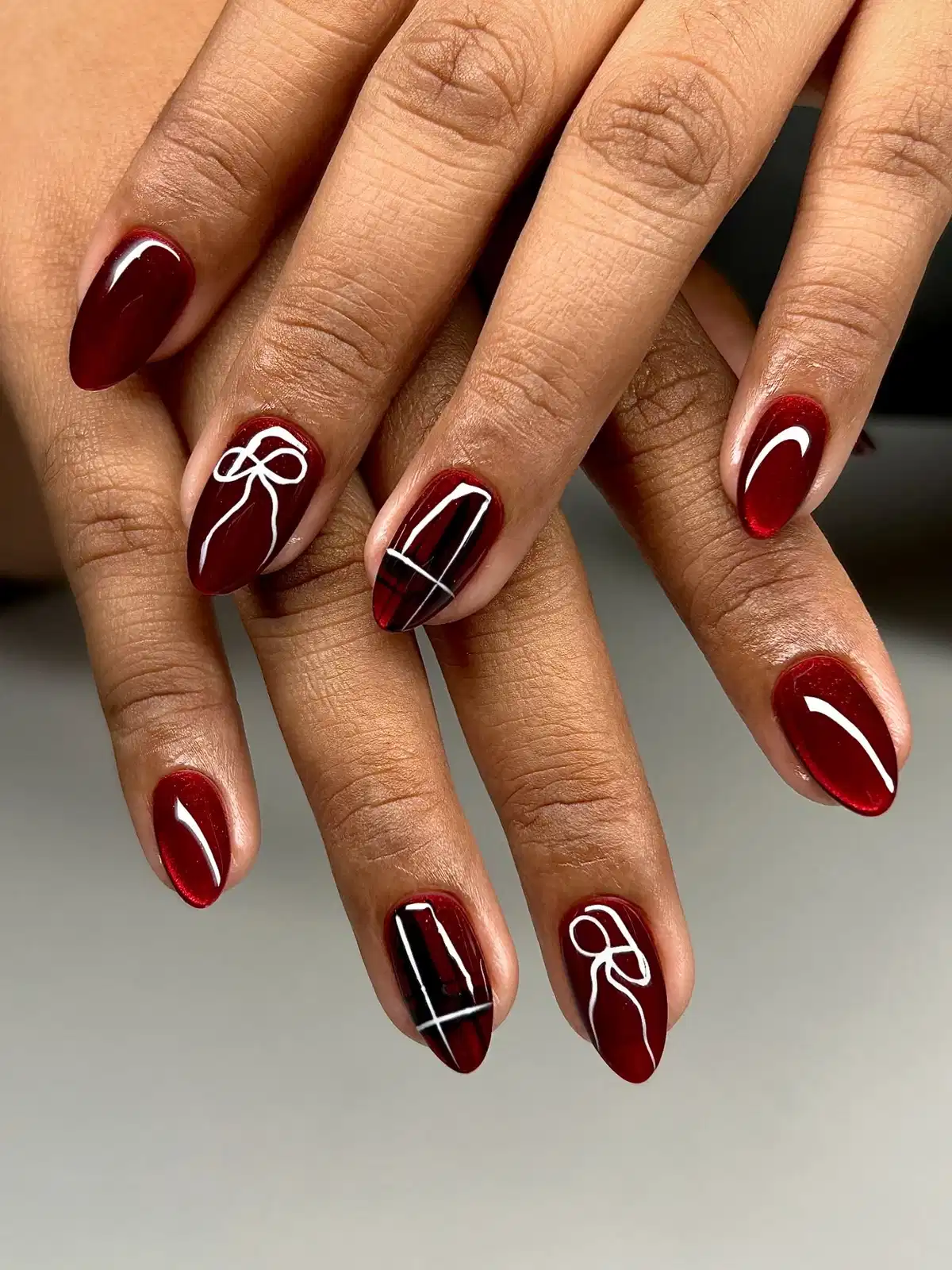 Maroon set with plaid accents and white bow line art