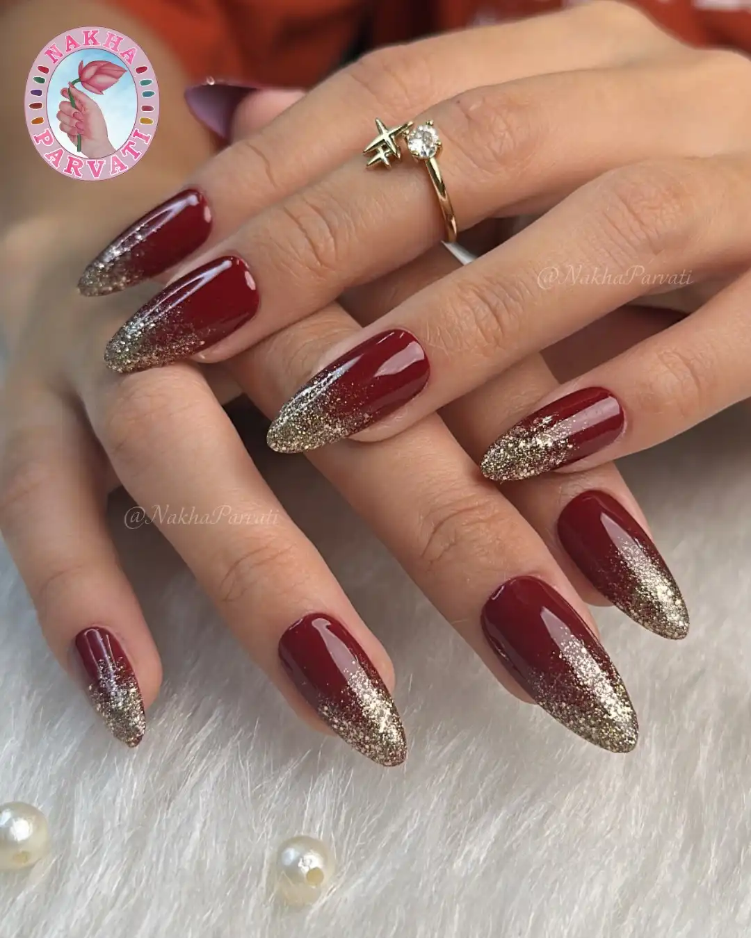 Maroon Almond Nails with Gold Glitter Ombré Tips