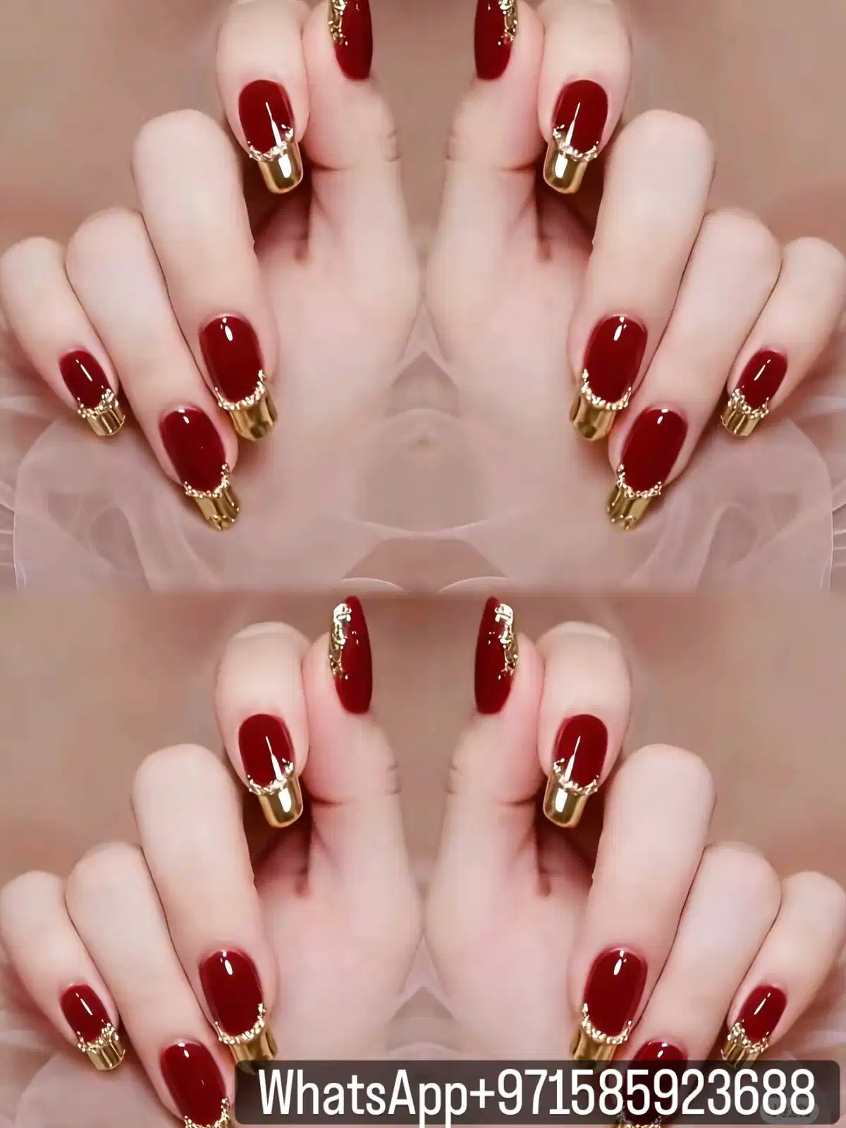Maroon nails with gold French tips and a rhinestone curve