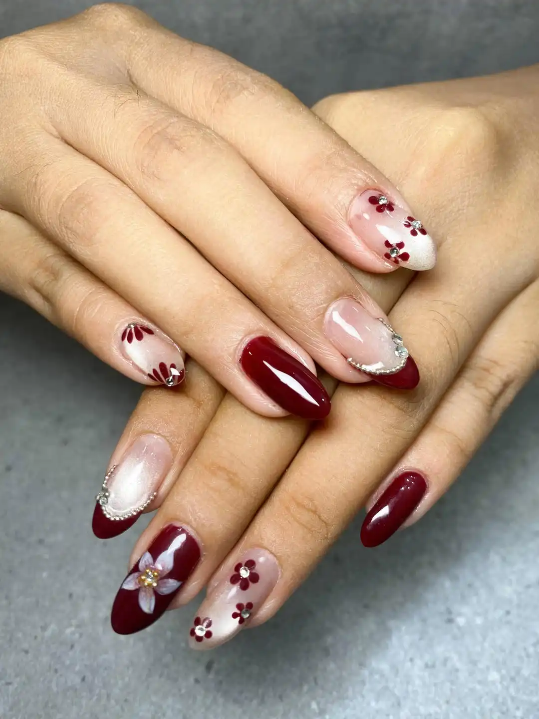Maroon florals with rhinestone-like centers
