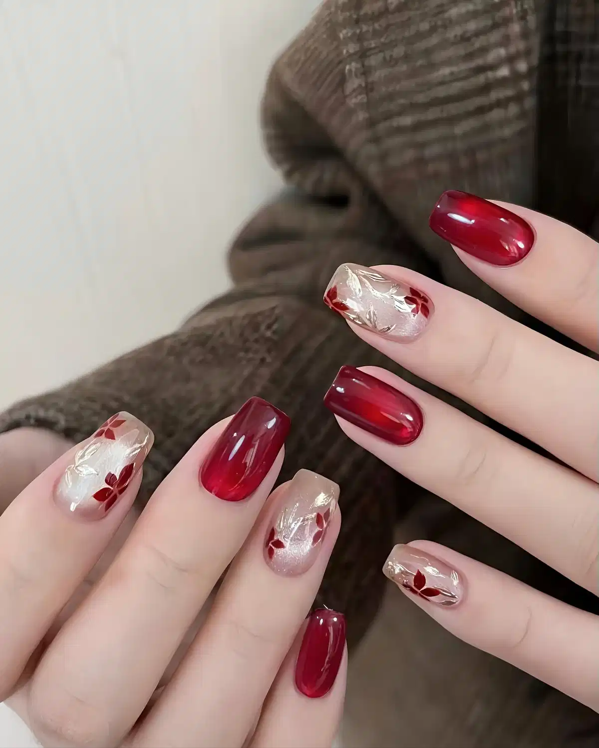 Translucent maroon with foil-like and leaf accents