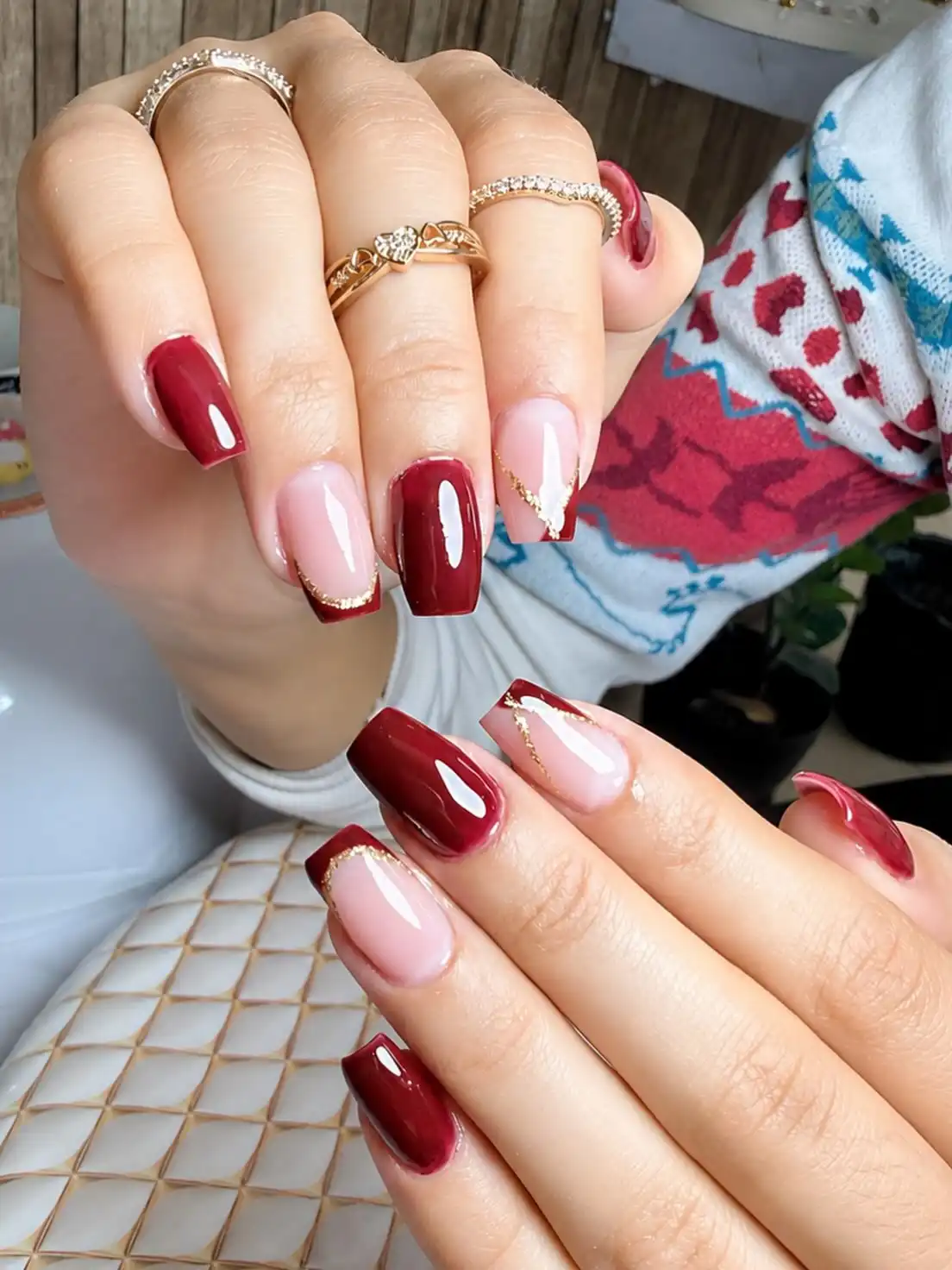 Glossy Maroon Set with Gold-Accented French Tips