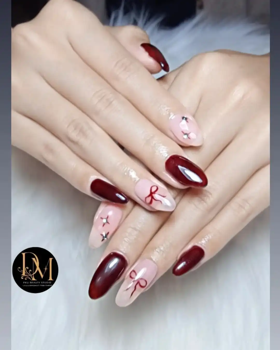 Maroon and nude mix with ribbon art and star rhinestones