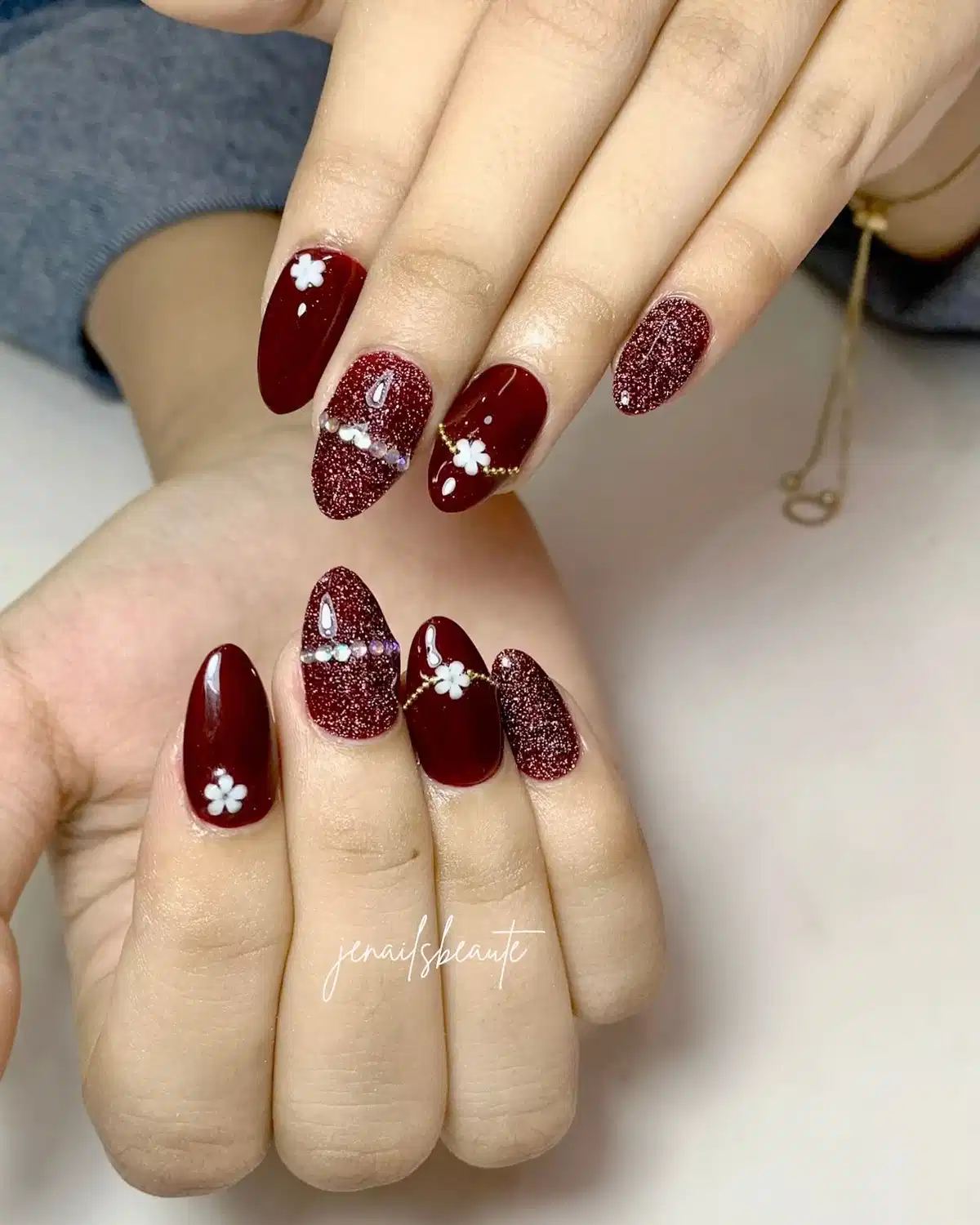 Maroon mix with glitter texture, white flowers, and rhinestone lines