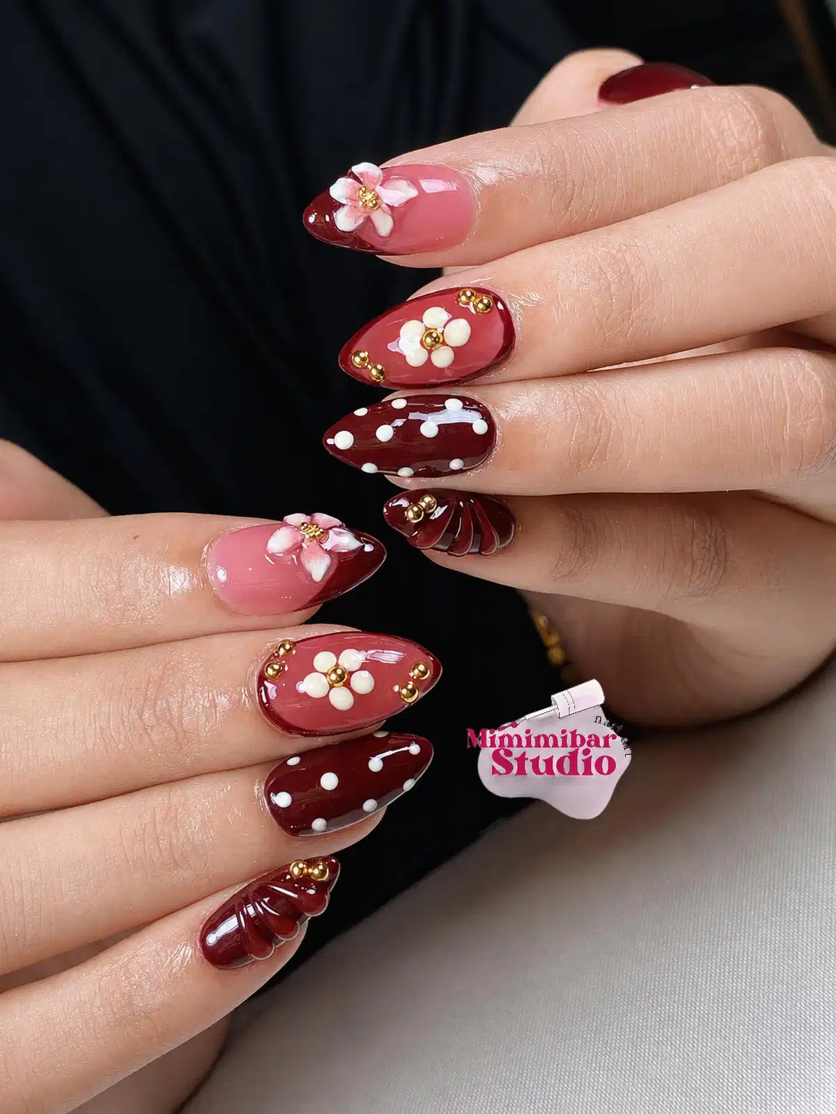 Maroon polka dots with raised florals and gold bead embellishments