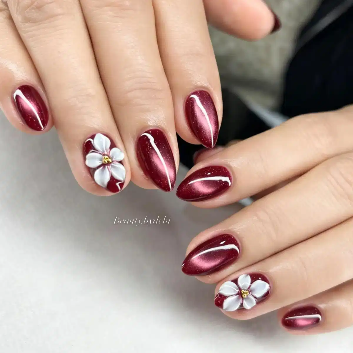 Metallic maroon with white 3D flower accents