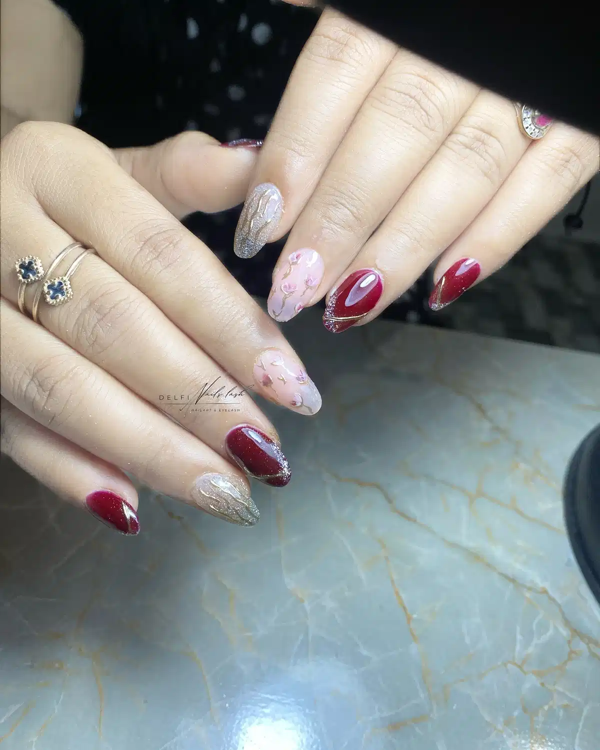 Mixed maroon, pink floral, and silver glitter set with gold lines