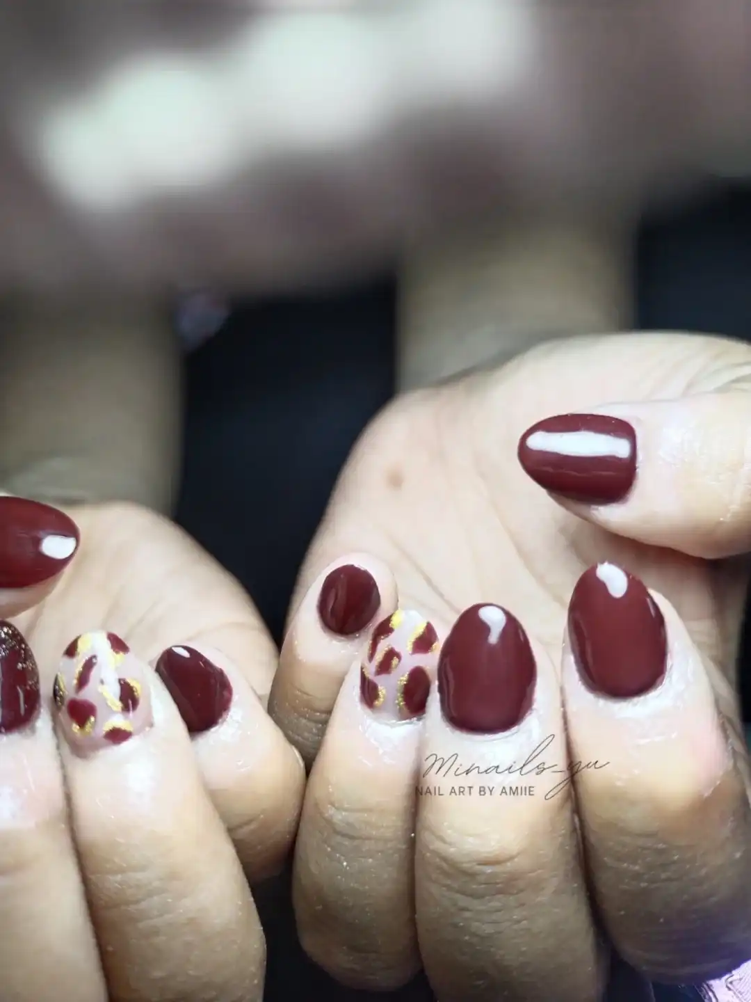 Maroon solids with nude-and-gold spotted accents