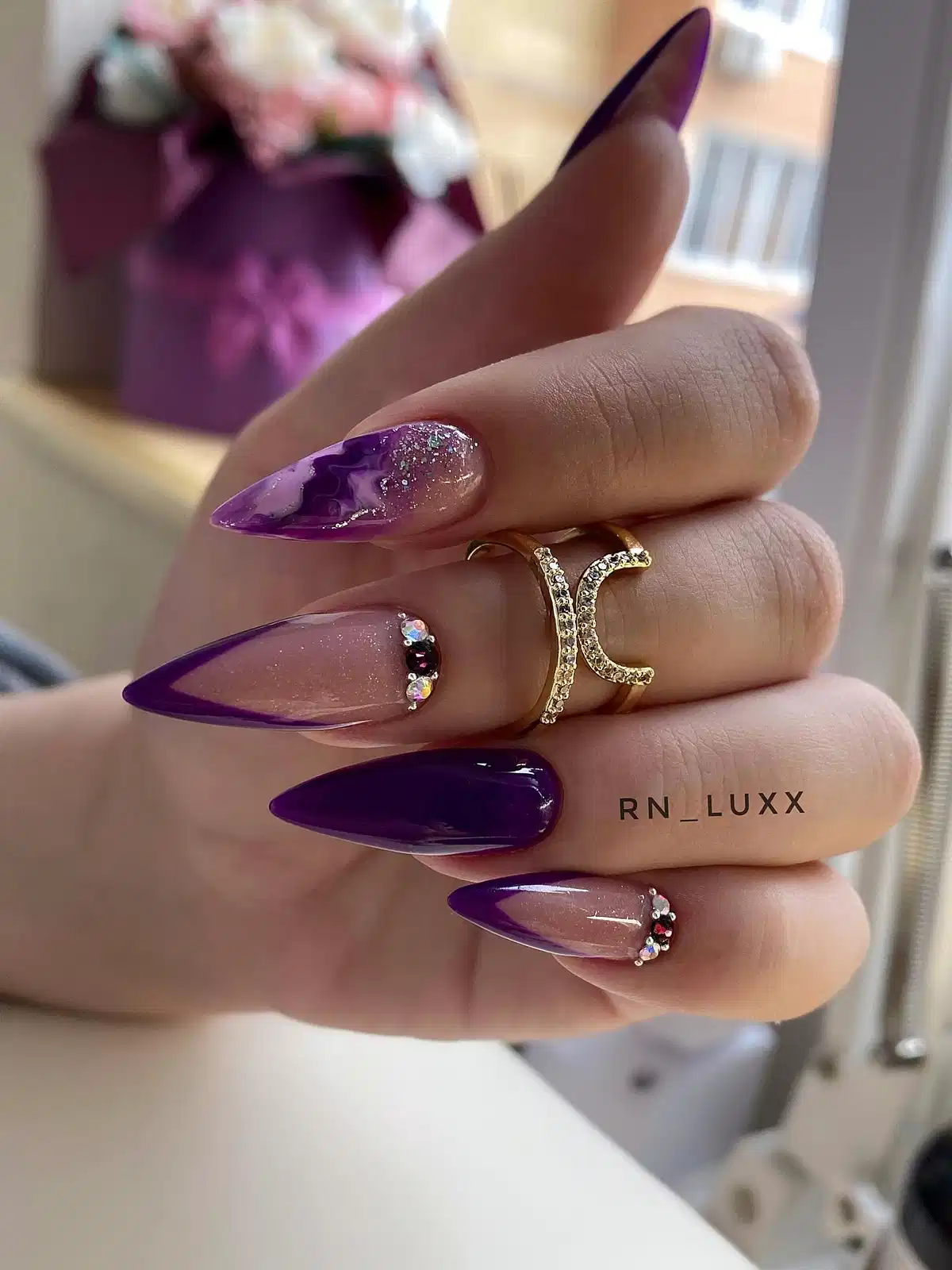 Stiletto purple outlines with rhinestone accents