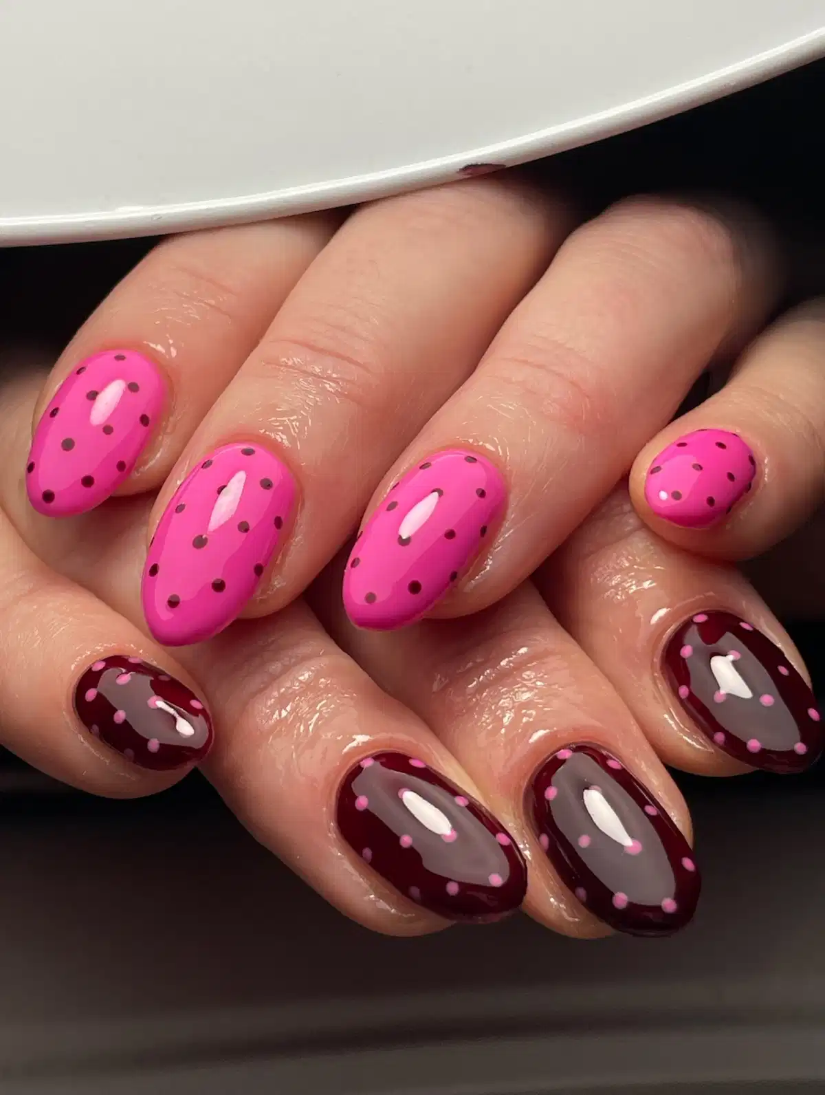 Bright pink dots paired with burgundy-and-taupe accents