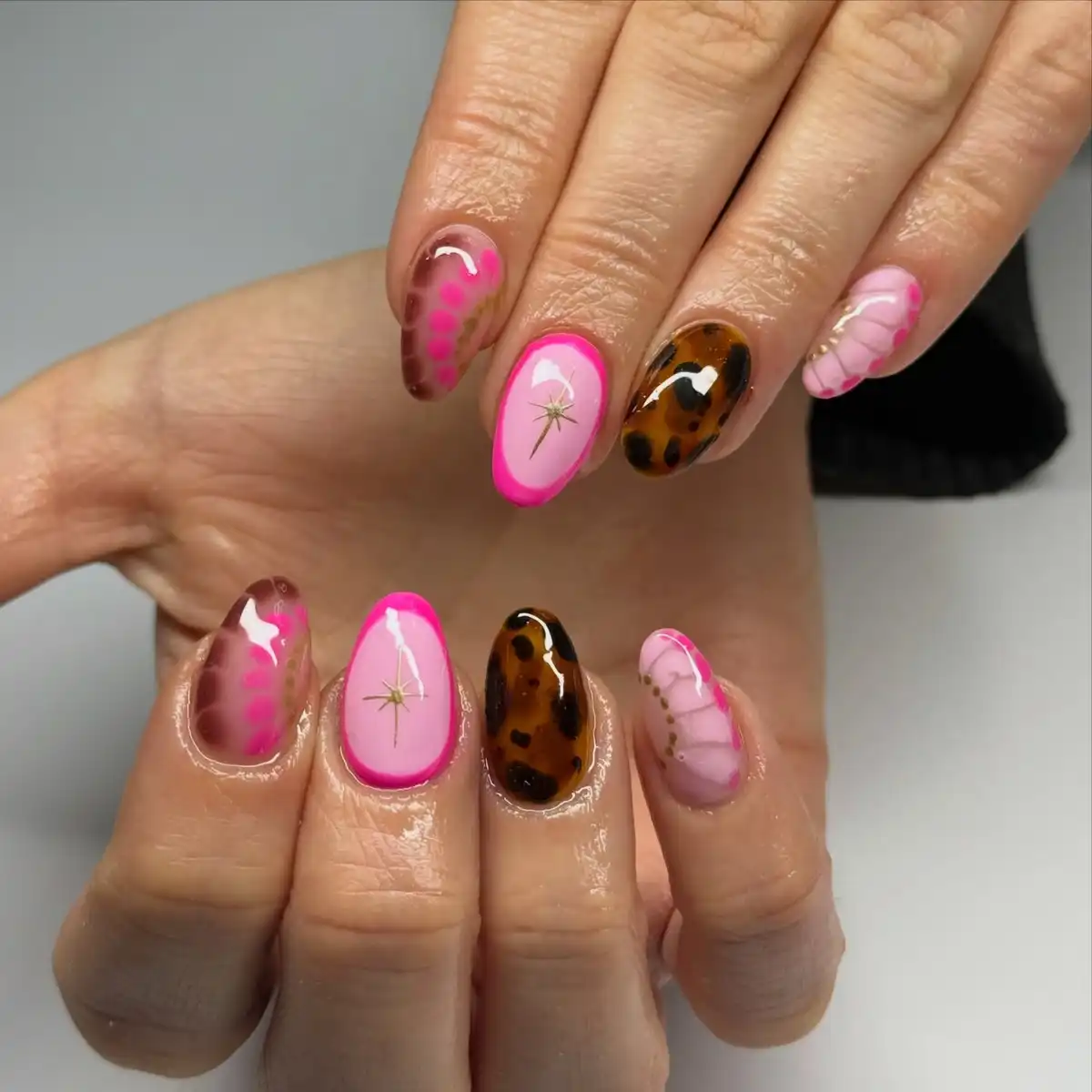 Bright pink outlines with brown spotted accents
