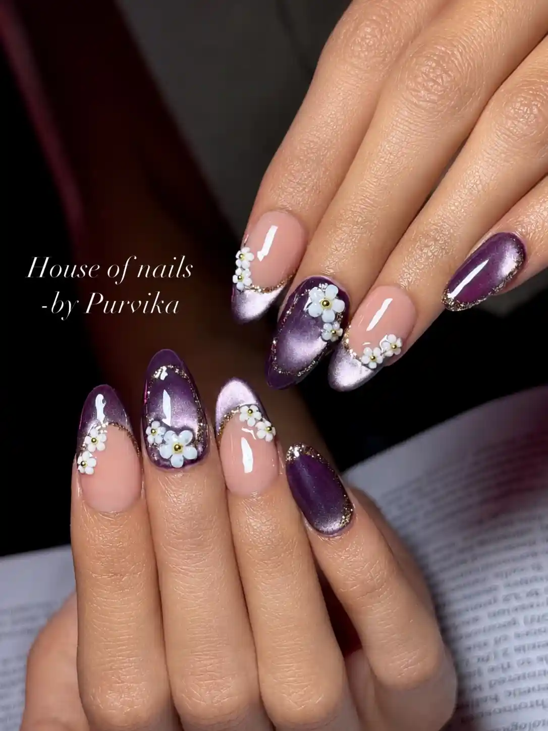 Nude and purple metallic French tips with white 3D flowers
