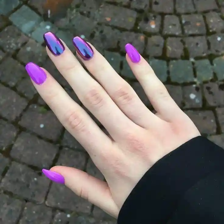 Bright purple nails with two dark mirror-accent nails