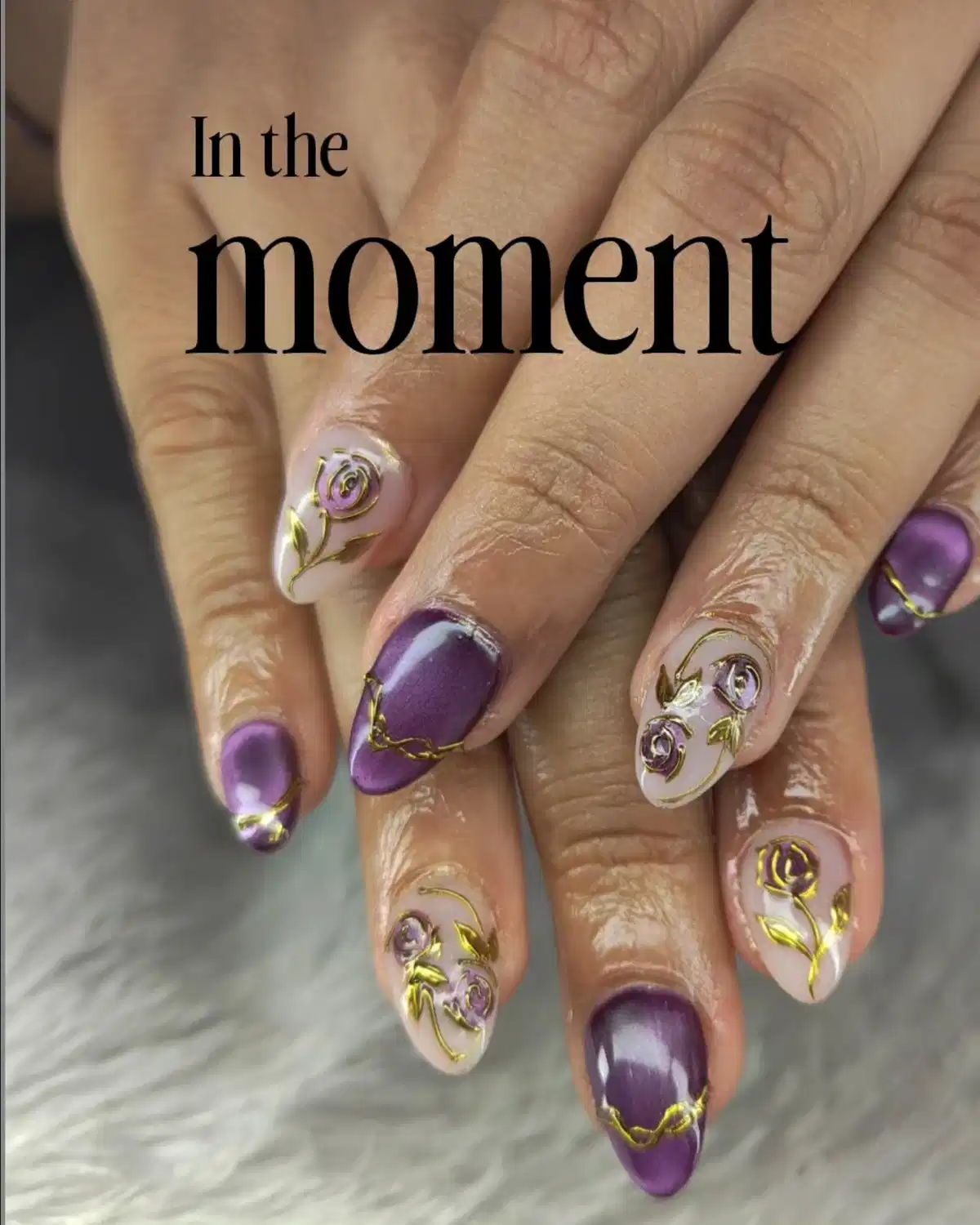 Purple and nude nails with gold rose line art