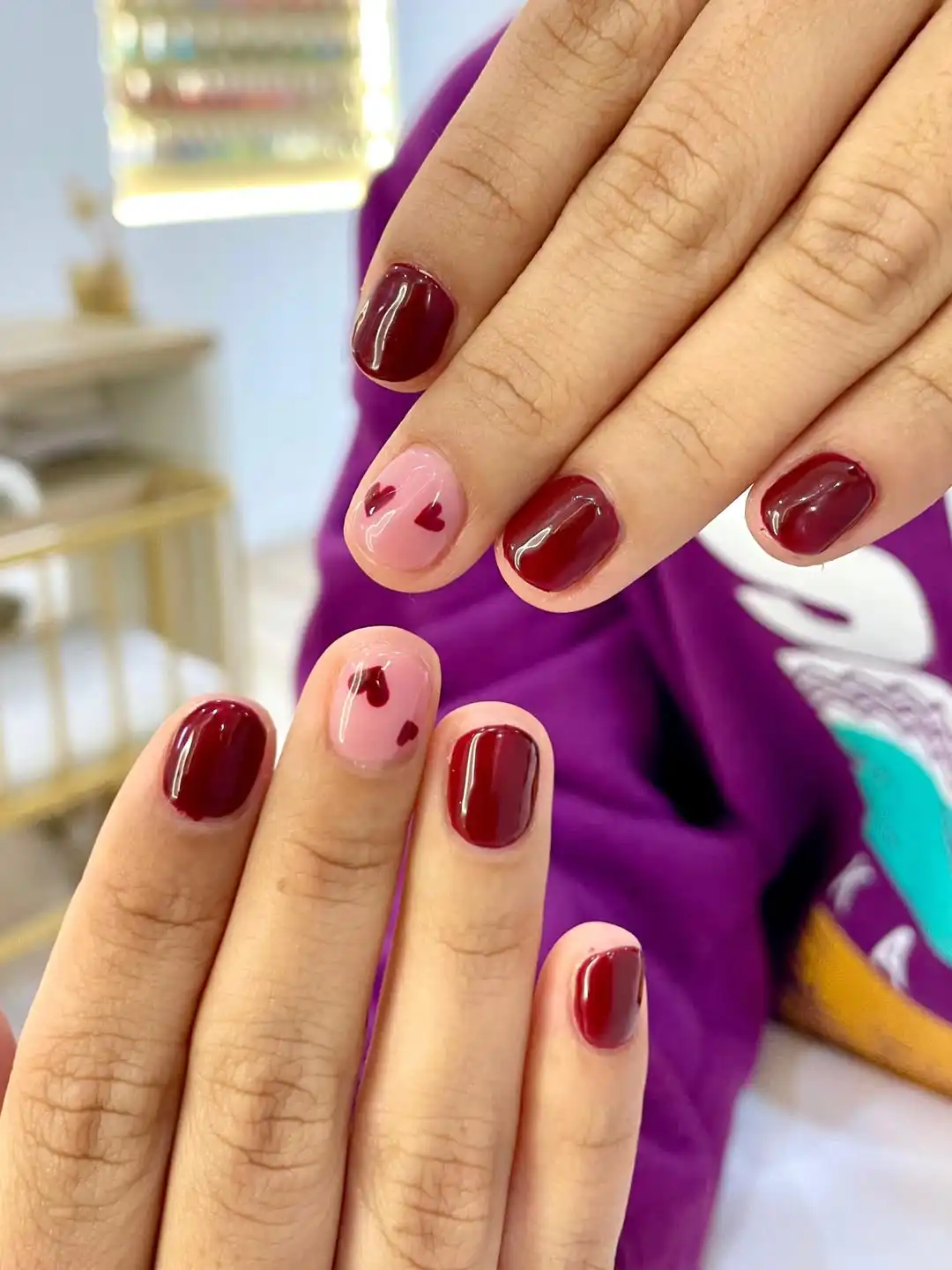 Glossy maroon with tiny heart accents