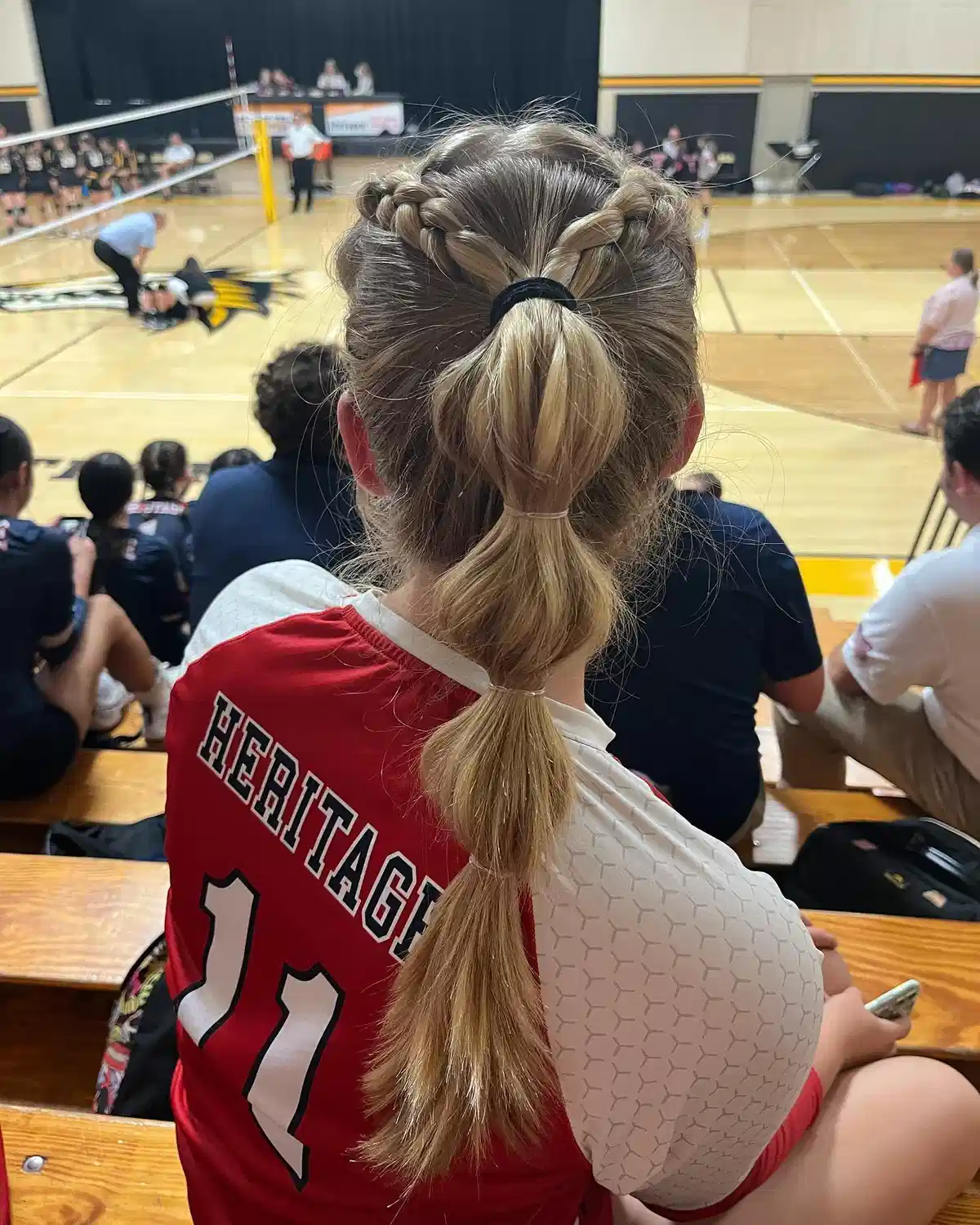 Segmented ponytail with side braids