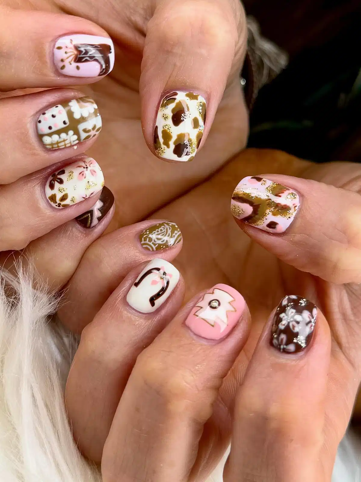 Cow print, florals, and gold-glitter accents