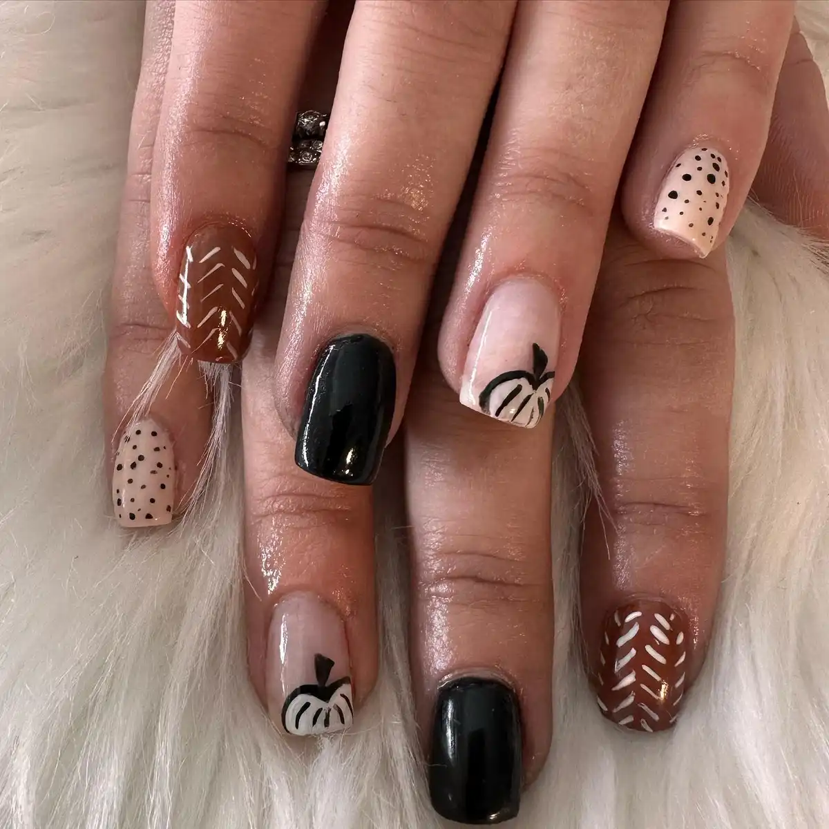 Neutral fall set with dotted nude, stitched brown, and pumpkin accents