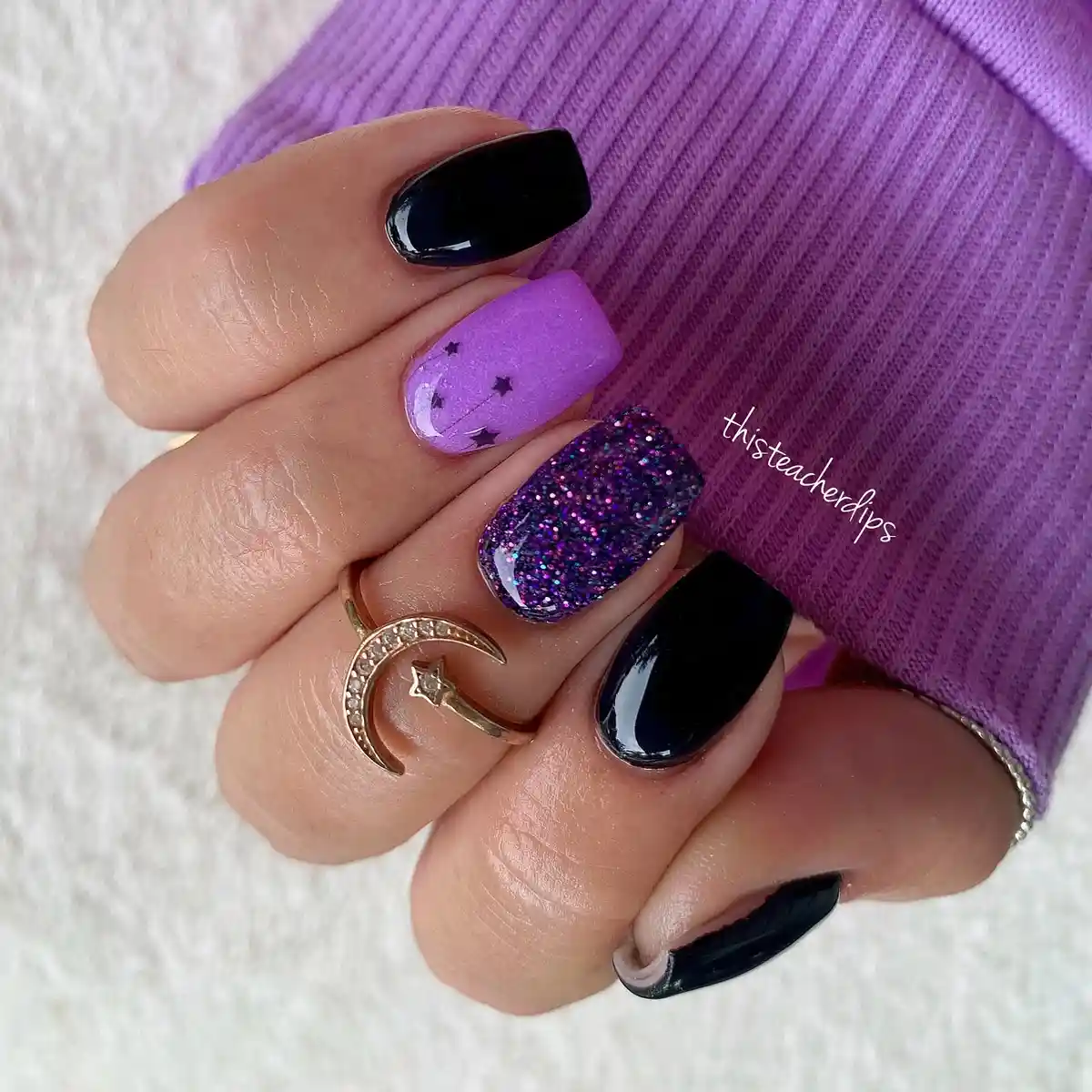 Glossy black with lilac stars and purple glitter accent