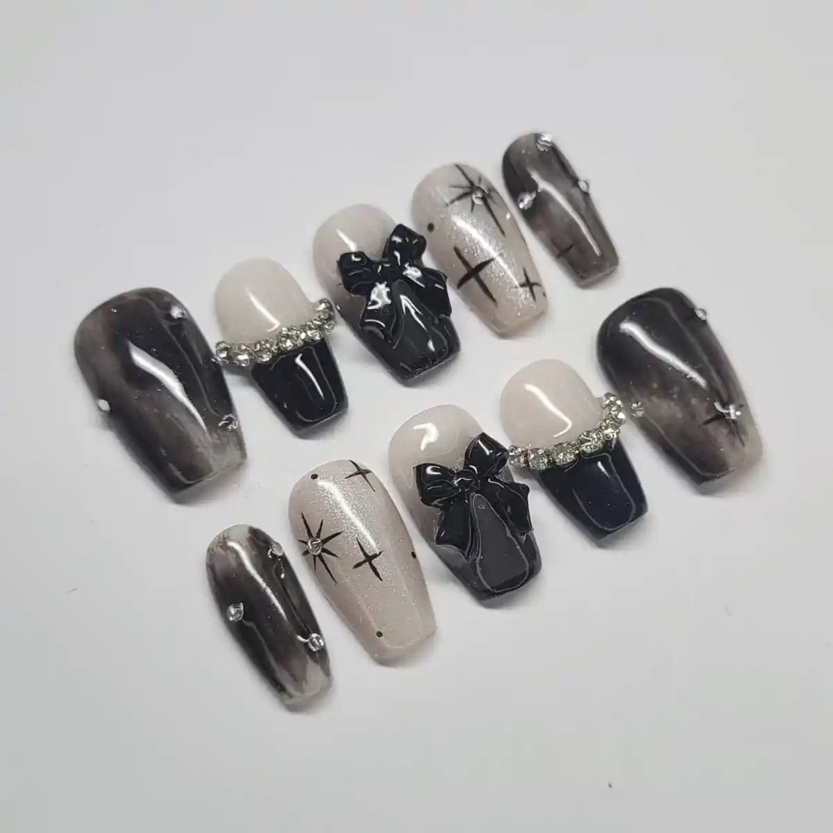 Black and nude mix with bows, starbursts, and gem bands