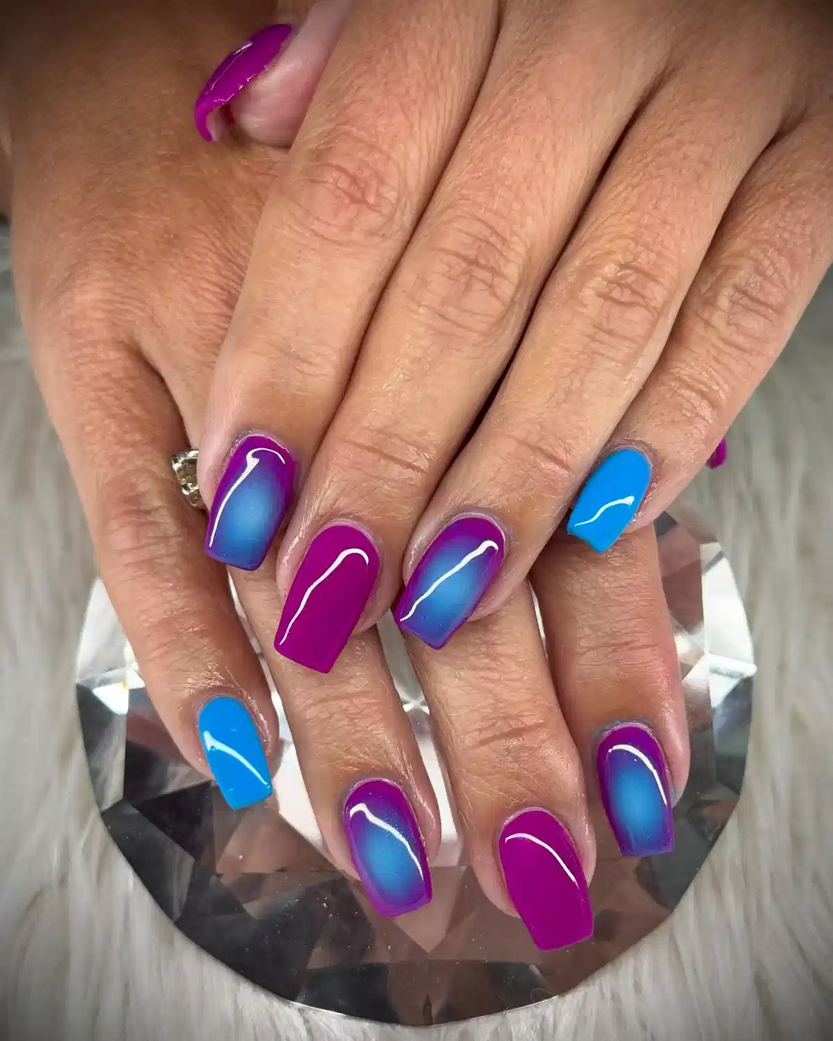 Bright blue and magenta mix with gradient accents