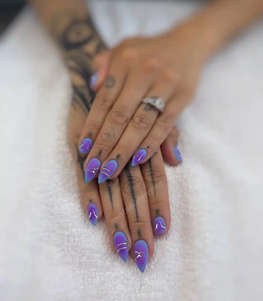 Long blue-to-purple gradient with thin metallic line accents