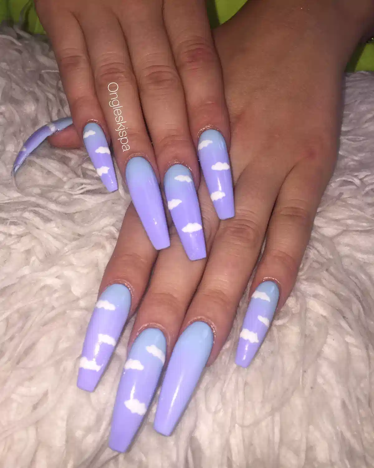 Pastel lavender and blue coffin nails with white clouds