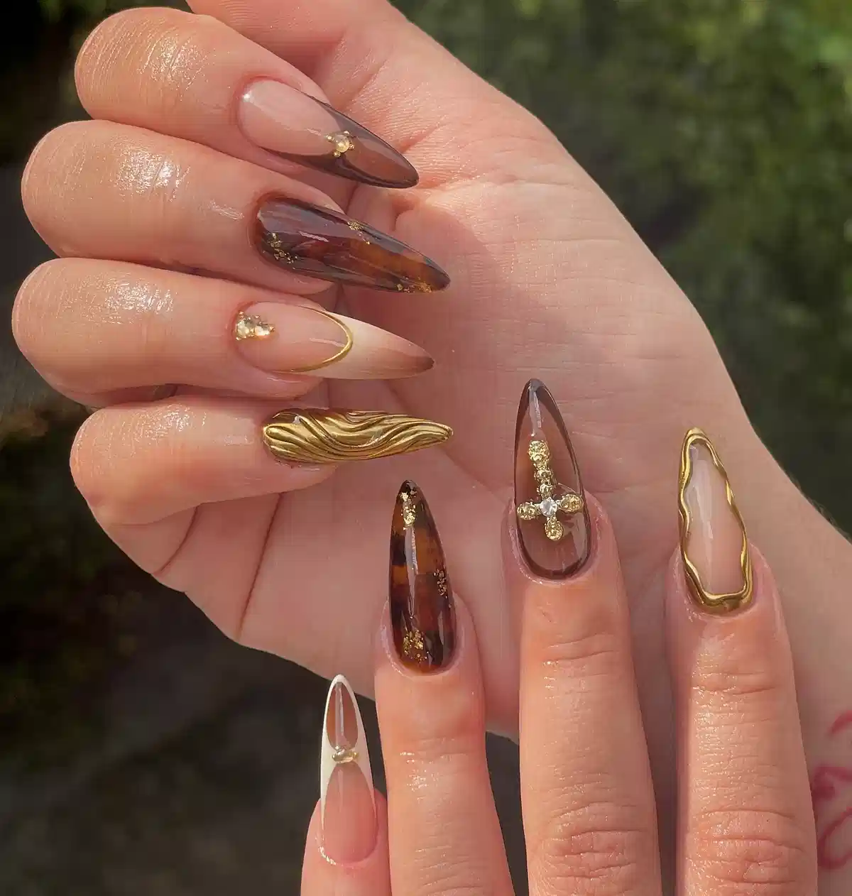 Mixed nude and brown set with sculpted gold accent and cross charm