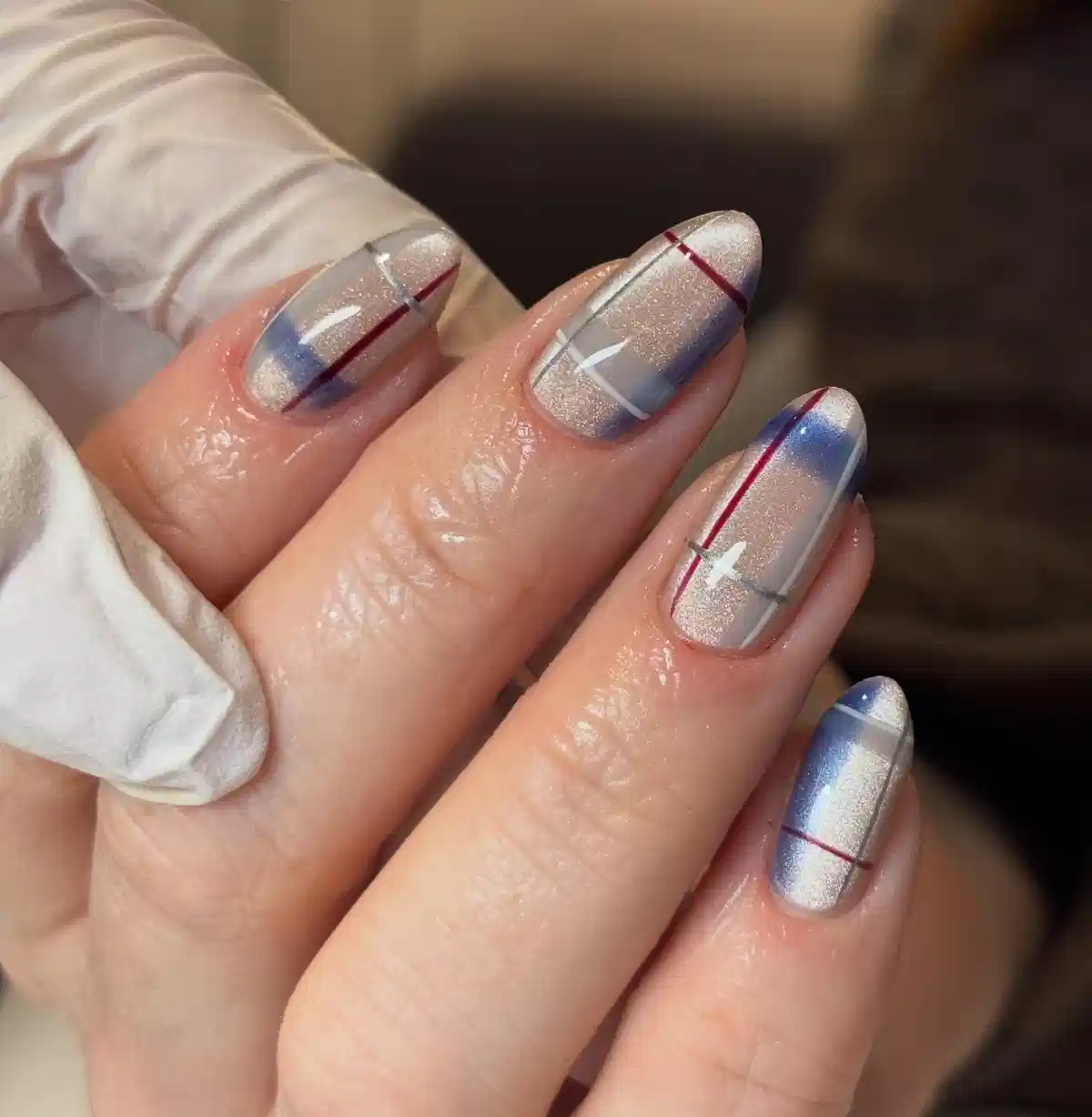 Silver shimmer base with thin multicolor plaid striping