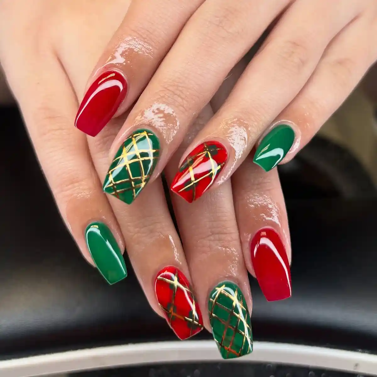Red and green nails with metallic gold crisscross plaid
