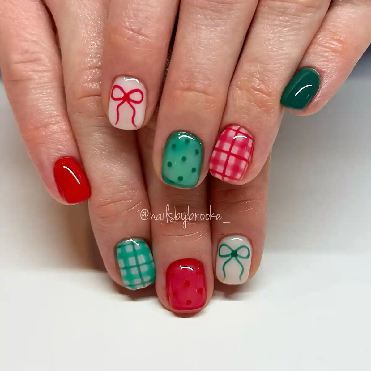 Mixed red/green plaid accents with bow details